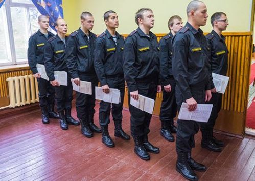 Northern Fleet draftees lined up with their paperwork in hand