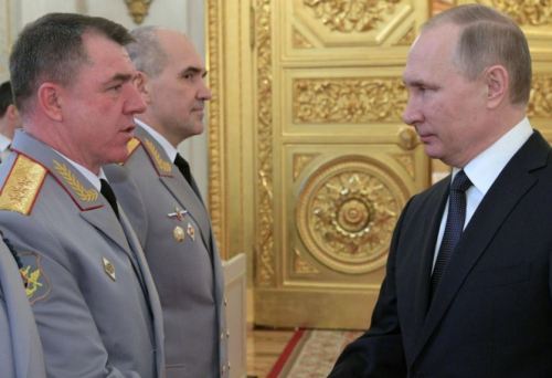 Zhuravlev shaking hands with Putin in 2017