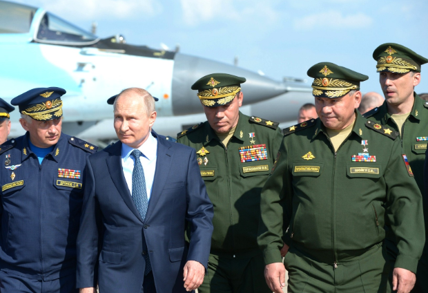 Putin walks the flight line at Akhtubinsk on May 14